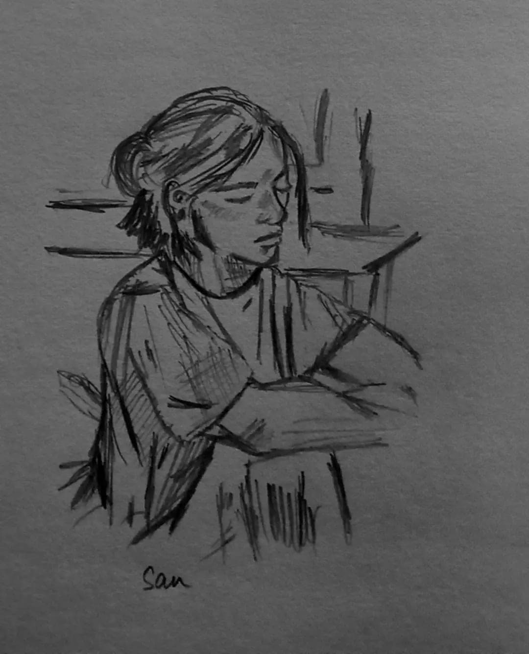 Charcoal sketch of a woman sitting by a window