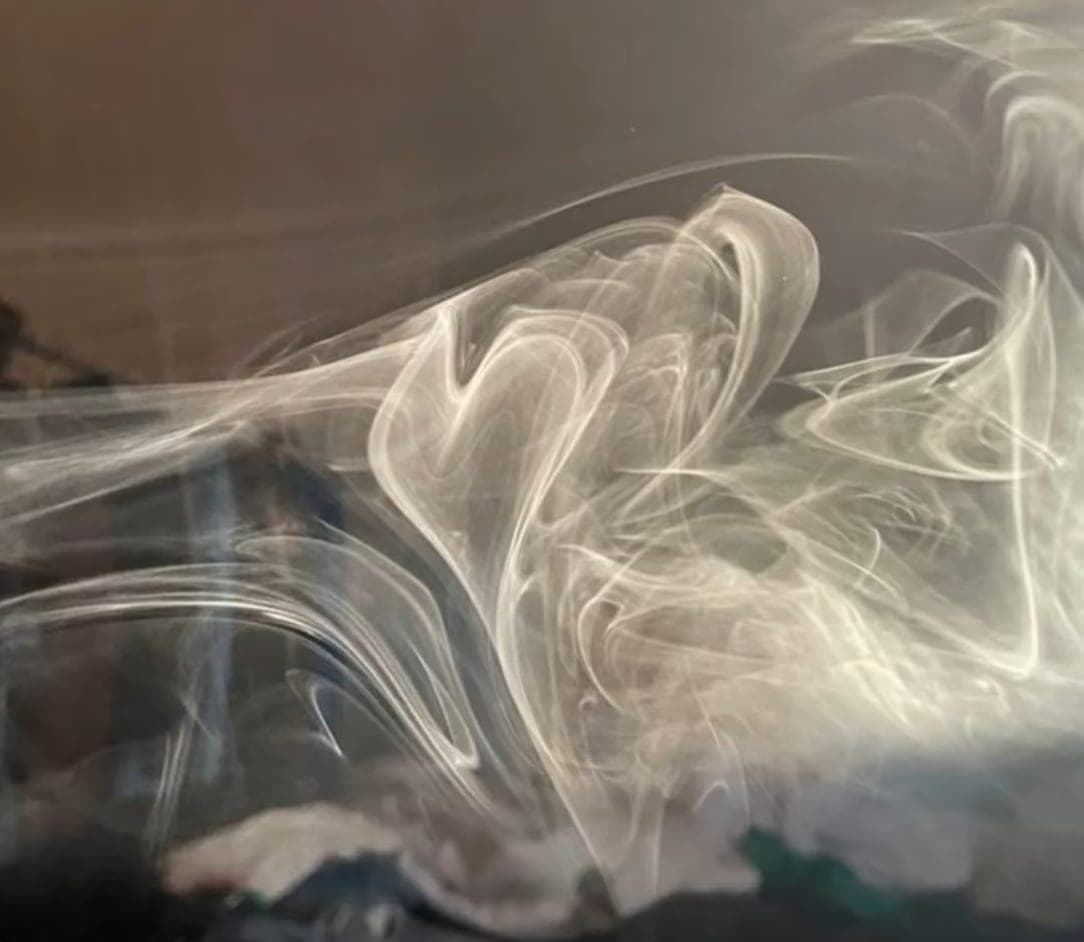 Long exposure of white smoke swirling